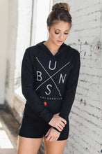 Athletic woman wearing a black unisex hoodie