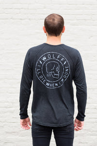 man in black long sleeve henley with large back graphic design of skull