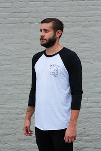 man in black and white baseball tee with front skull pocket print